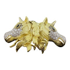 Broche/collier à double licorne en or jaune 18 carats et diamants