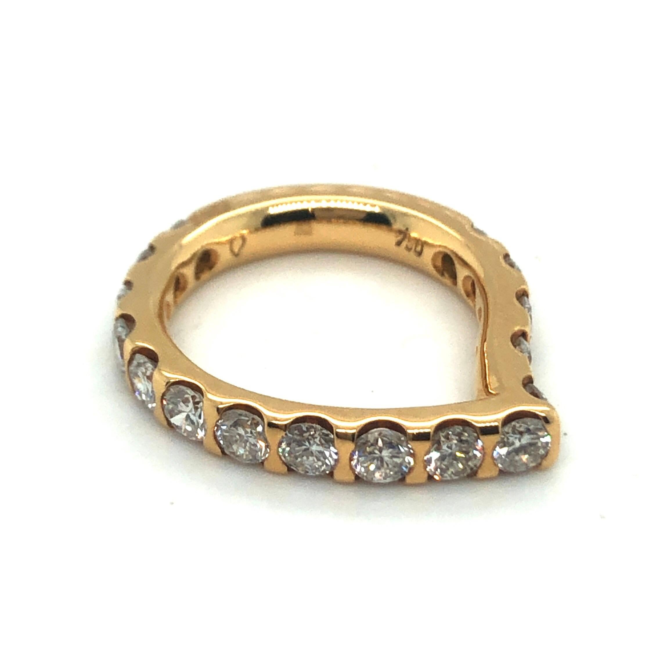 18 karat yellow gold diamond 'Drop' ring by German designer Tamara Comolli.
This fancy asymmetric drop-shaped band ring is crafted in 18 karat yellow gold and set with 16 brilliant-cut diamonds totalling circa 1.92 carats.

This jewel is in very