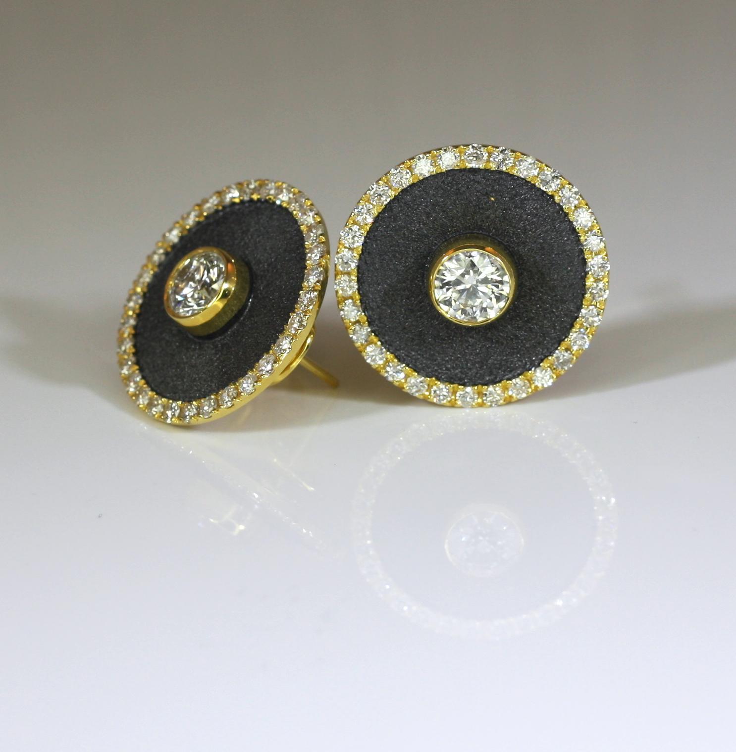 S.Georgios designer Earrings in 18 Karat yellow gold all handmade. The gorgeous earrings feature center Brilliant Cut Diamonds: weight 1.01 Carat and 1.08 Carat and Brilliant Cut Diamonds on the rims, the total weight of 1.90 Carat, all in contrast