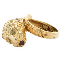 18 Karat Yellow Gold Diamond, Emerald, and Ruby Panther Ring