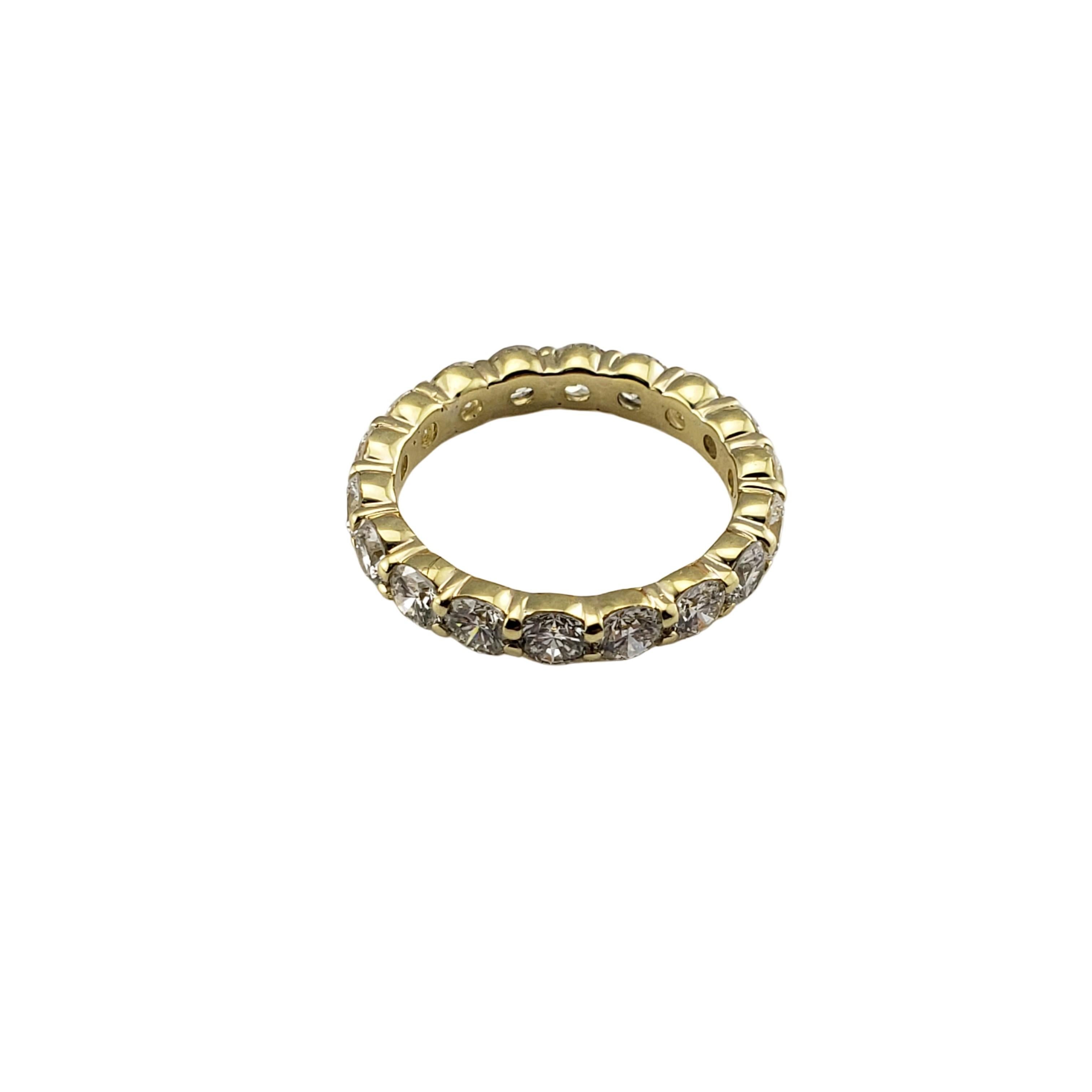 18 Karat Yellow Gold Diamond Eternity Band Ring Size 5.5-

This sparkling eternity band features 18 round brilliant cut diamonds set in classic 18K yellow gold.  Width:  3.5 mm.

Approximate total diamond weight:  2.50 ct.

Diamond color: 