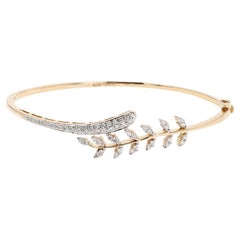 18 Karat Yellow Gold Diamond Flower Bangle