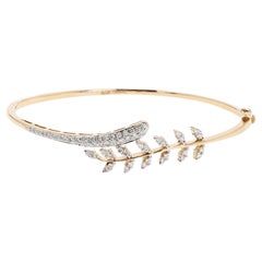 18 Karat Yellow Gold Diamond Flower Bangle