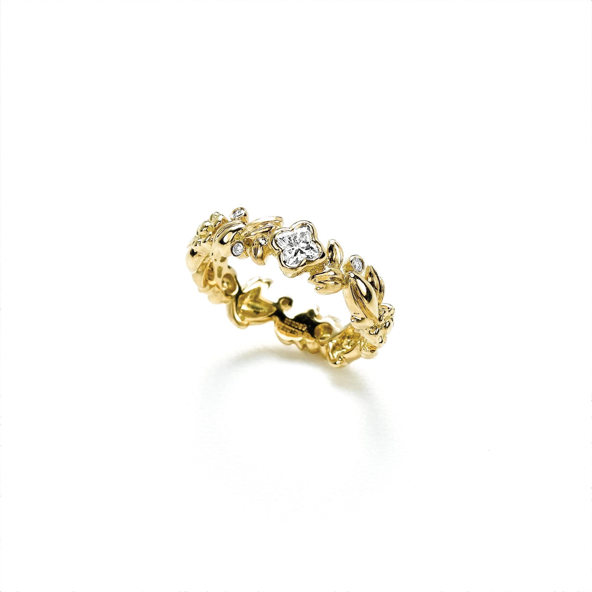18 Karat Yellow Gold  Diamond Flower leaf ring 0.28 Carat Total . .1 LILY CUT ® flower shape diamond H color VS SI clarity  0.25 cts . Additional 0.03 ct round diamond accent . Available in  Finger sizes 5,6,7 .
