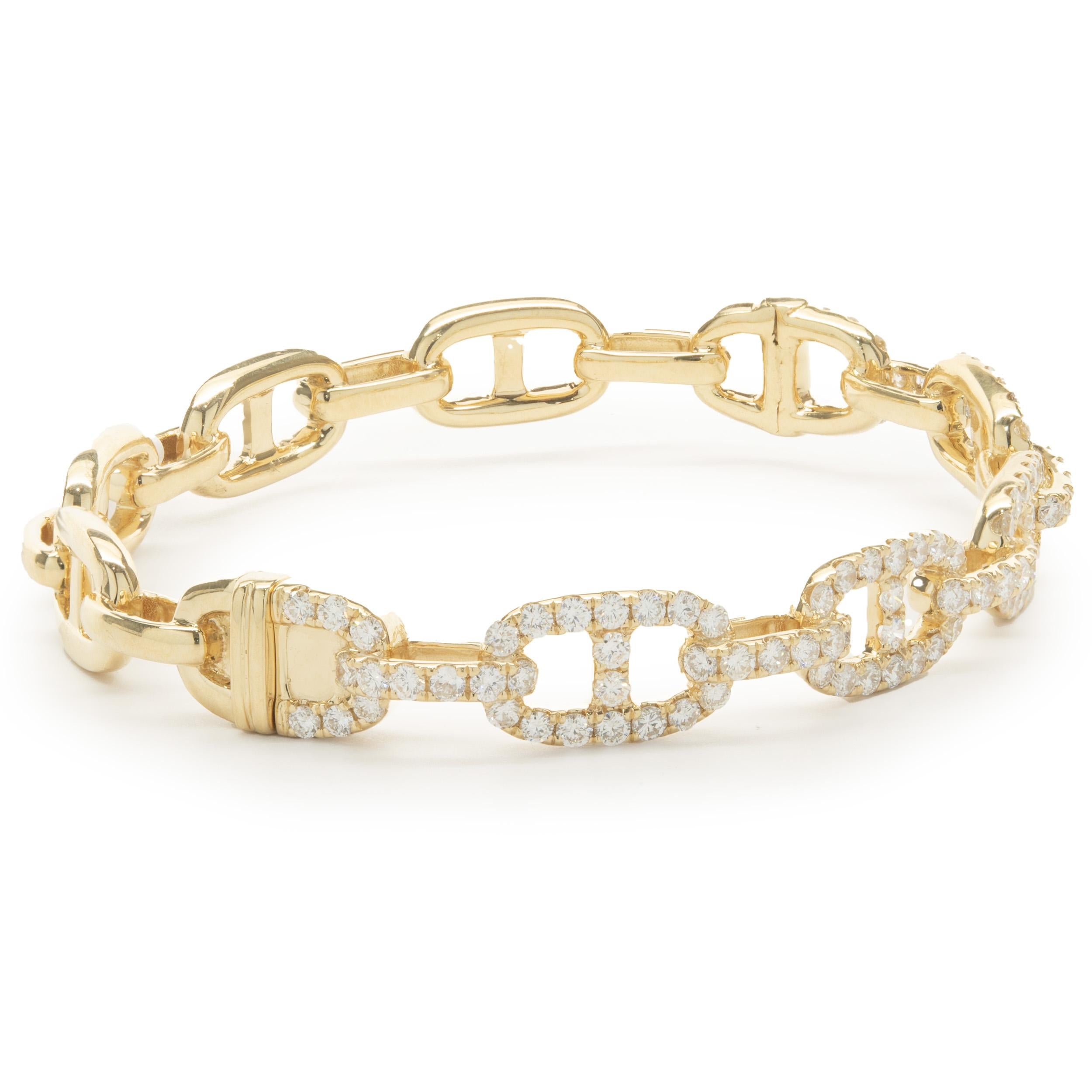 Material: 18K yellow gold
Diamonds:  106 round cut = 3.00cttw
Color: G
Clarity: VS
Dimensions: bracelet will fit up to a 6.5-inch wrist 
Weight: 27.40 grams