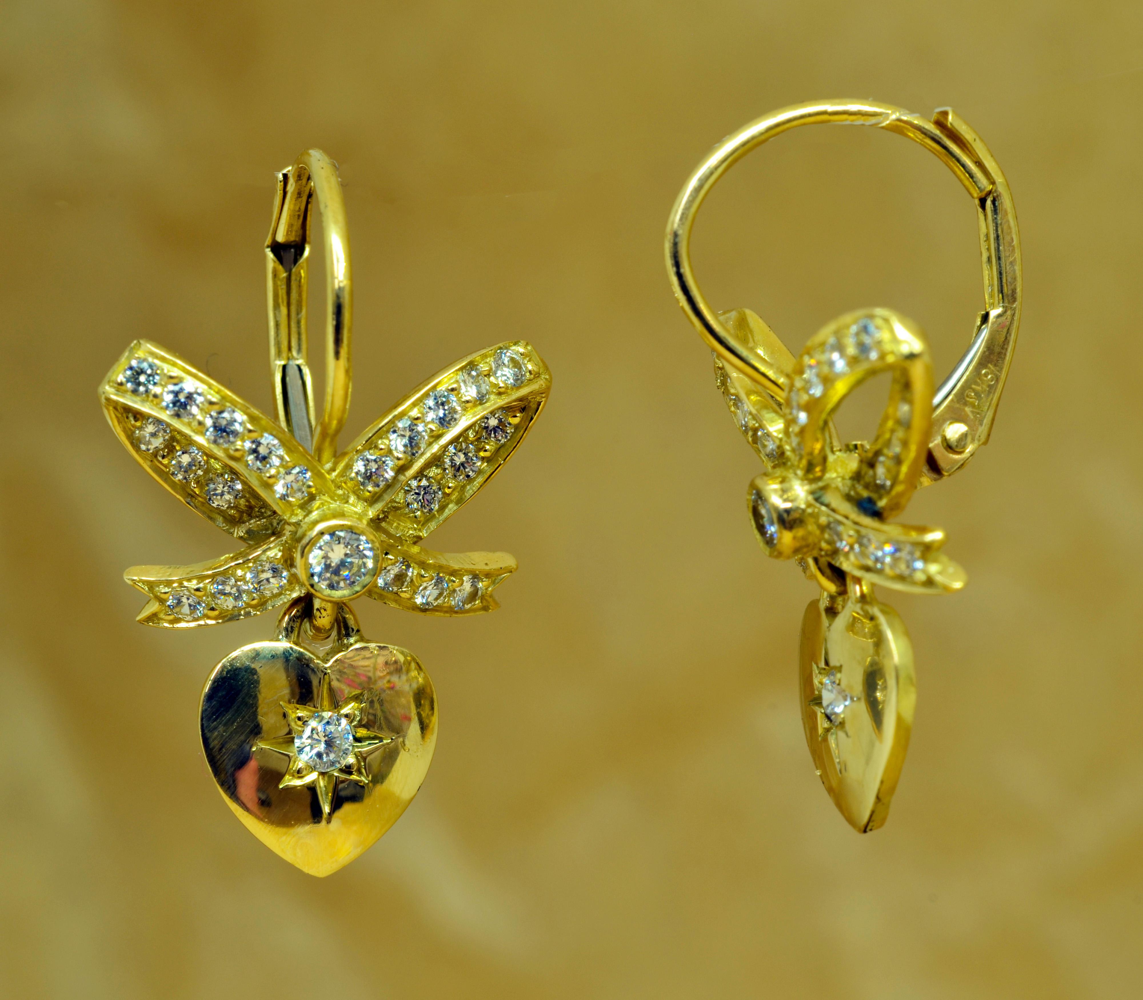Women's 18 Karat Yellow Gold Diamond Heart and Bow Dangle Lever Back Earrings For Sale