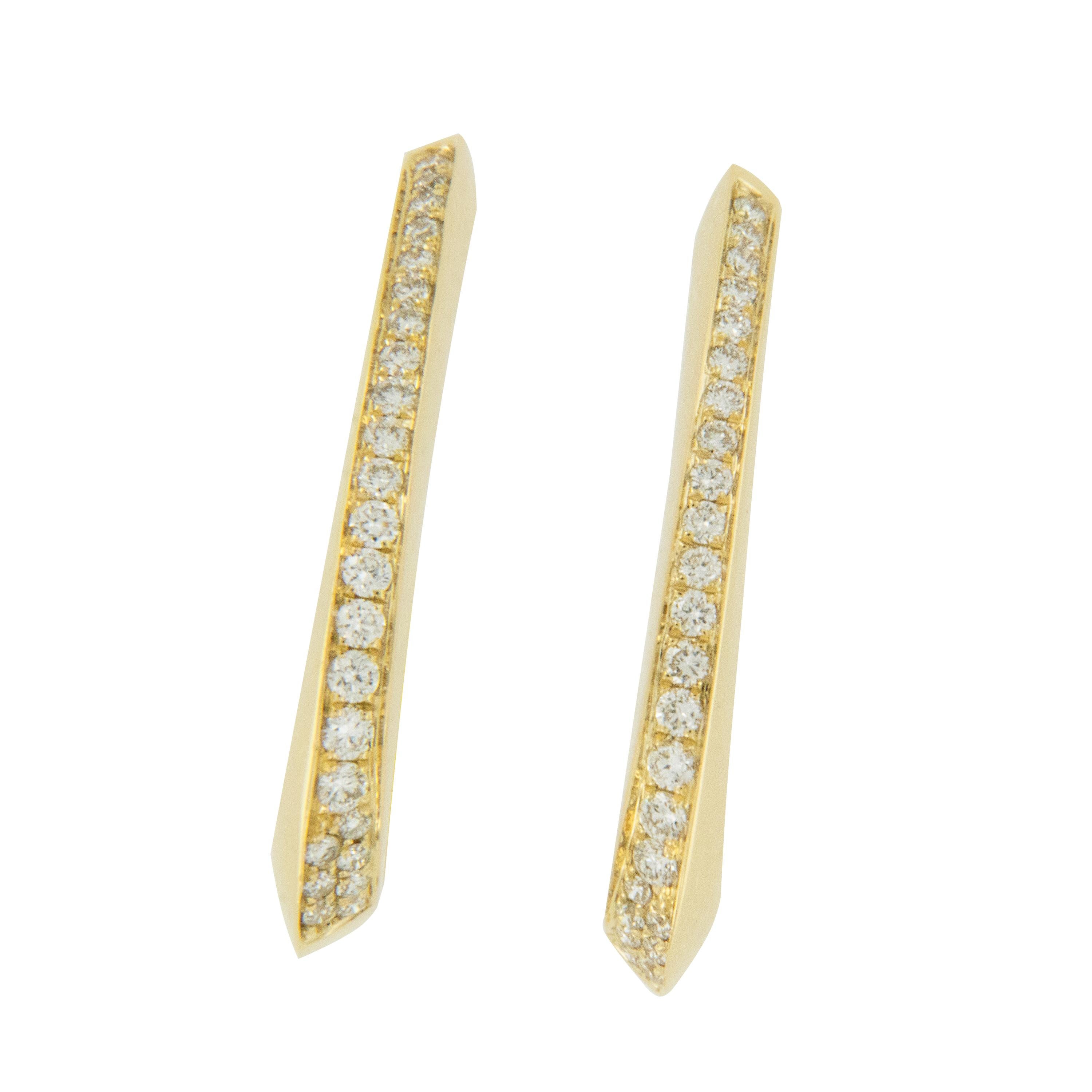 These are the perfect earrings to wear everyday and still be knockouts into the evenings! Made for Campanelli & Pear of fine 18 karat yellow gold in complimentary oval hoop shape with 0.36 Cttw diamonds pave' set in the ever so slight twist to