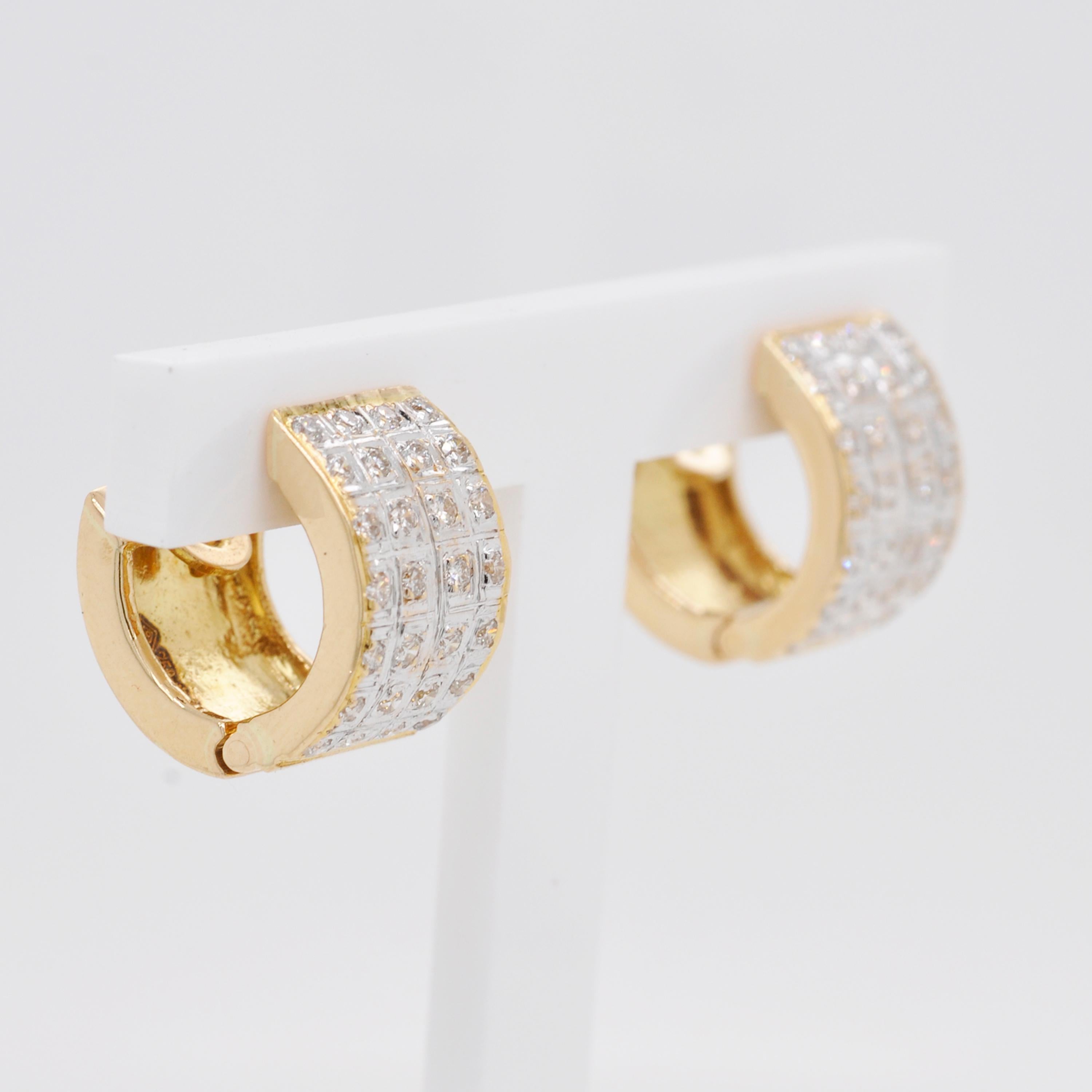 18 karat gold huggie earrings
