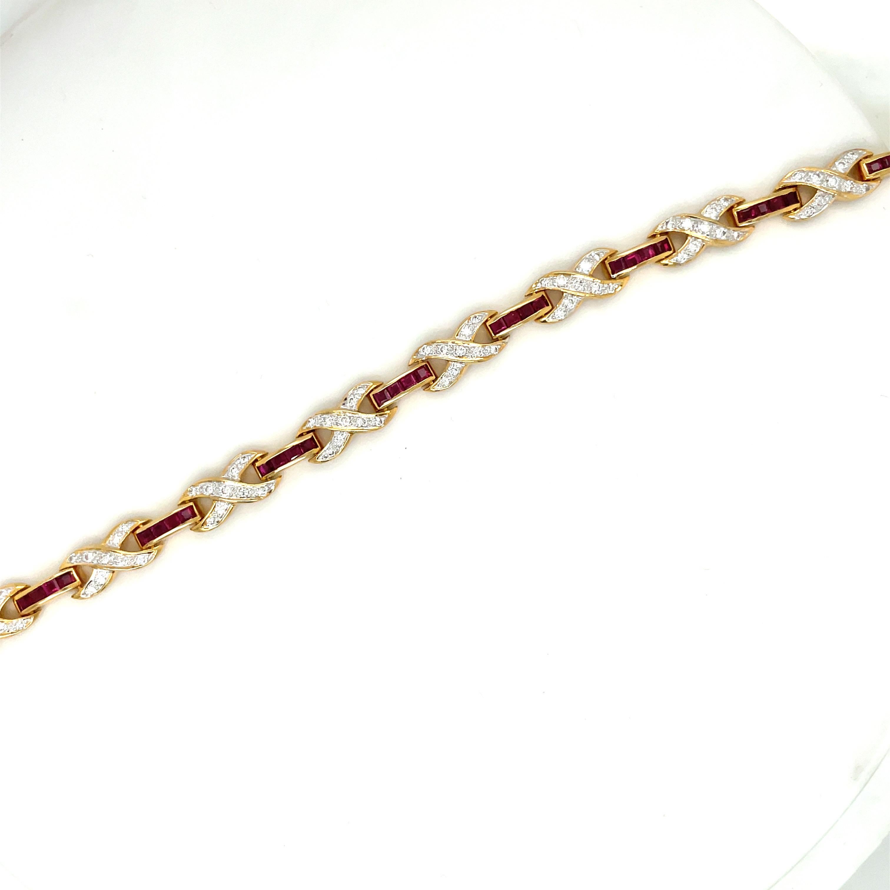 18 Karat Yellow Gold Diamond Infinity Motif and Invisibly Set Ruby Bracelet For Sale 1