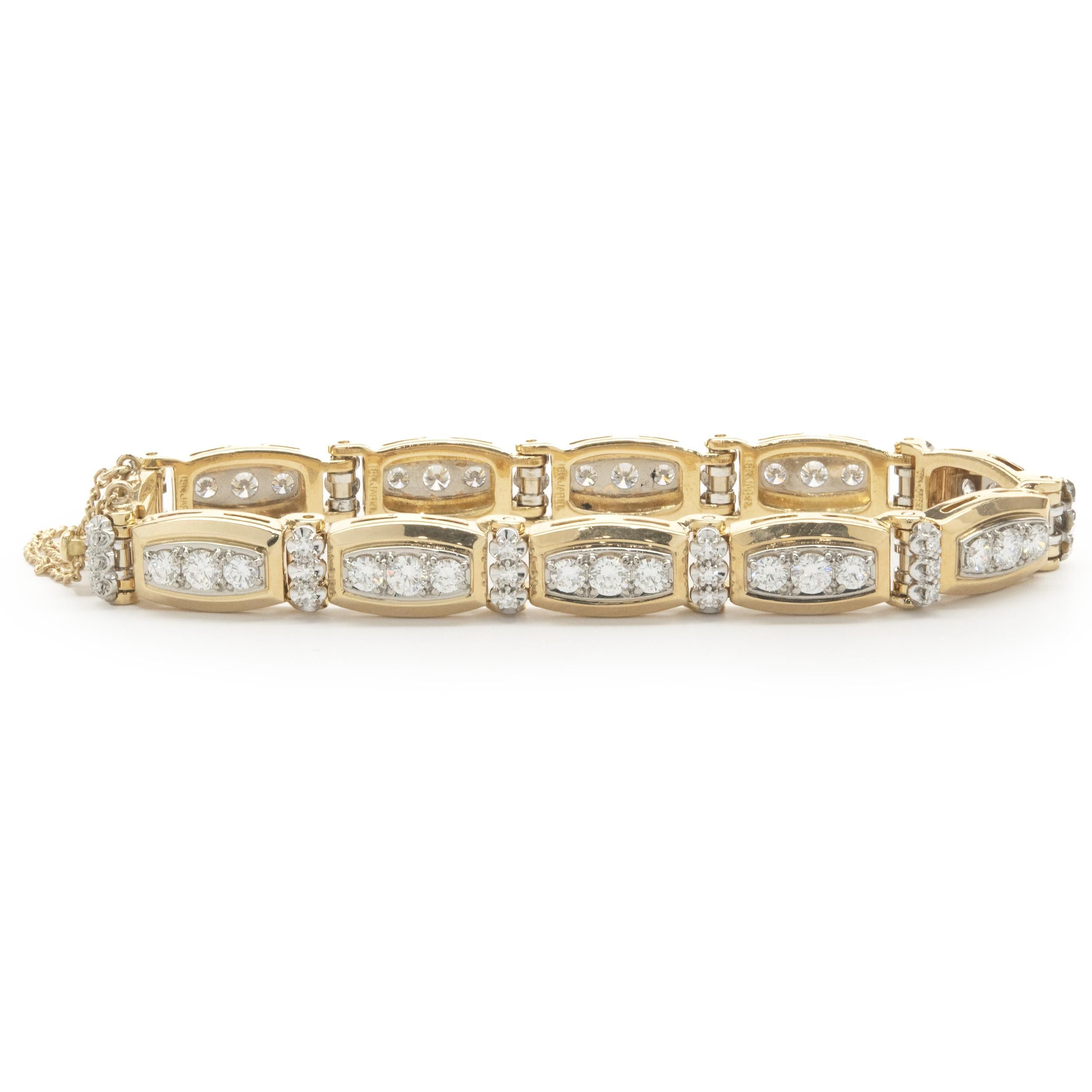 Designer: custom
Material: 18K yellow gold
Diamonds: 66 round brilliant cut = 3.14cttw
Color: G
Clarity: SI1
Dimensions: bracelet will fit up to a 7-inch wrist
Weight: 29.73 grams