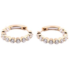 Boucles d'oreilles en or jaune 18 carats avec diamants