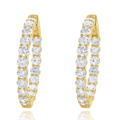 Pendientes de aro con interior y exterior de diamantes en oro amarillo de 18 quilates