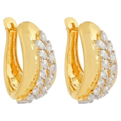 Boucles d'oreilles feuille en or jaune 18 carats et diamants