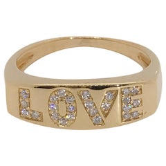 18 Karat Yellow Gold Diamond LOVE Ring