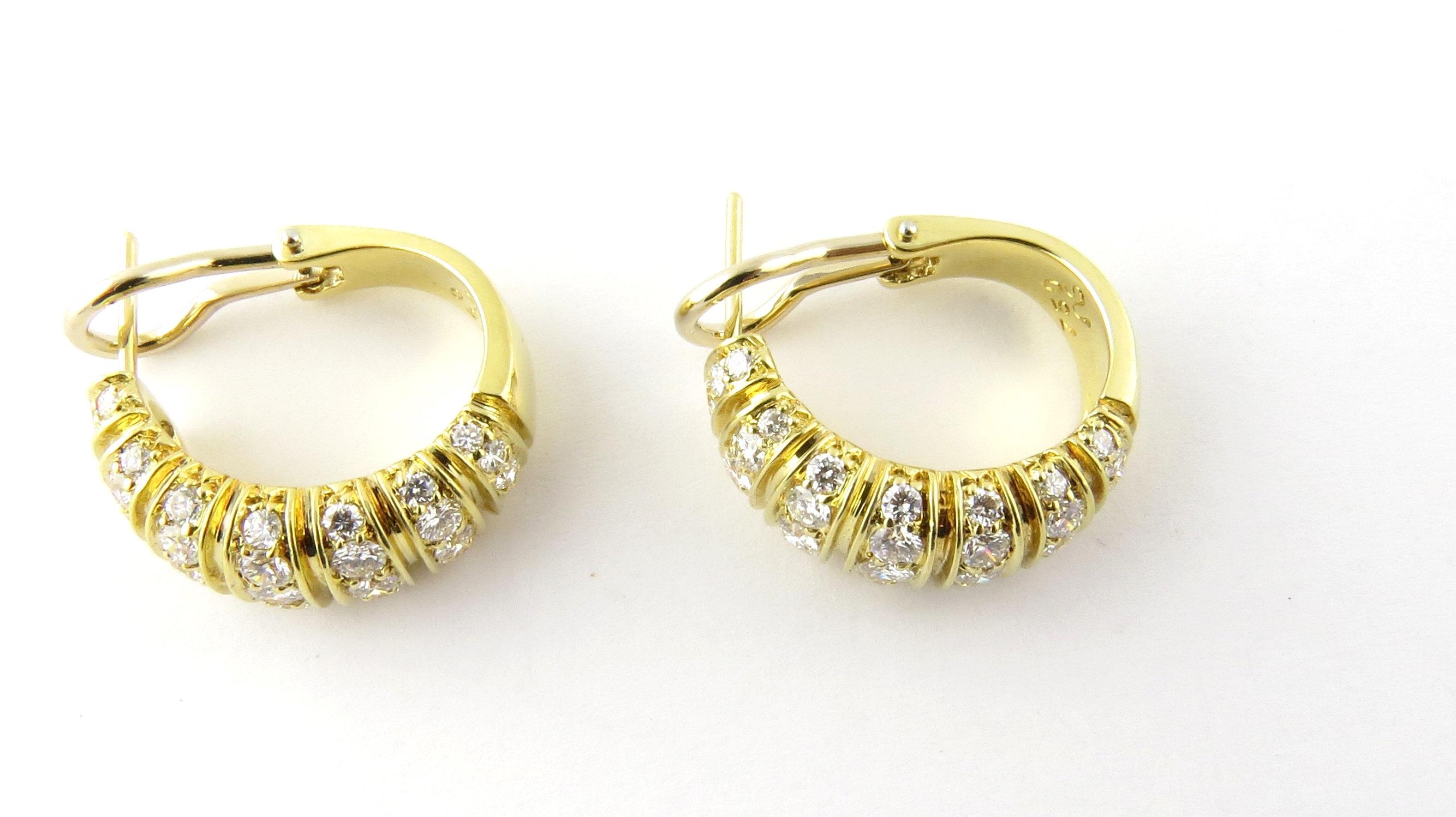 Vintage 18K Yellow Gold Diamond Oval Hoop Earrings

These oval hoop earrings shine with sparkle from the diamonds and the polished gold!

35 round brilliant diamonds per earring. Earrings total approx. 2.5 carats.

VS1 clarity and F-G
