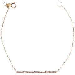 Bracelet à barrettes en or jaune 18 carats avec diamants pavés et baguettes