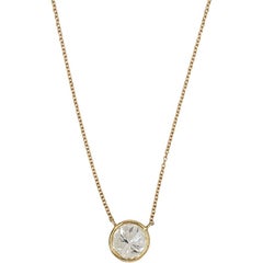 Ciondolo con diamante in oro giallo 18 carati