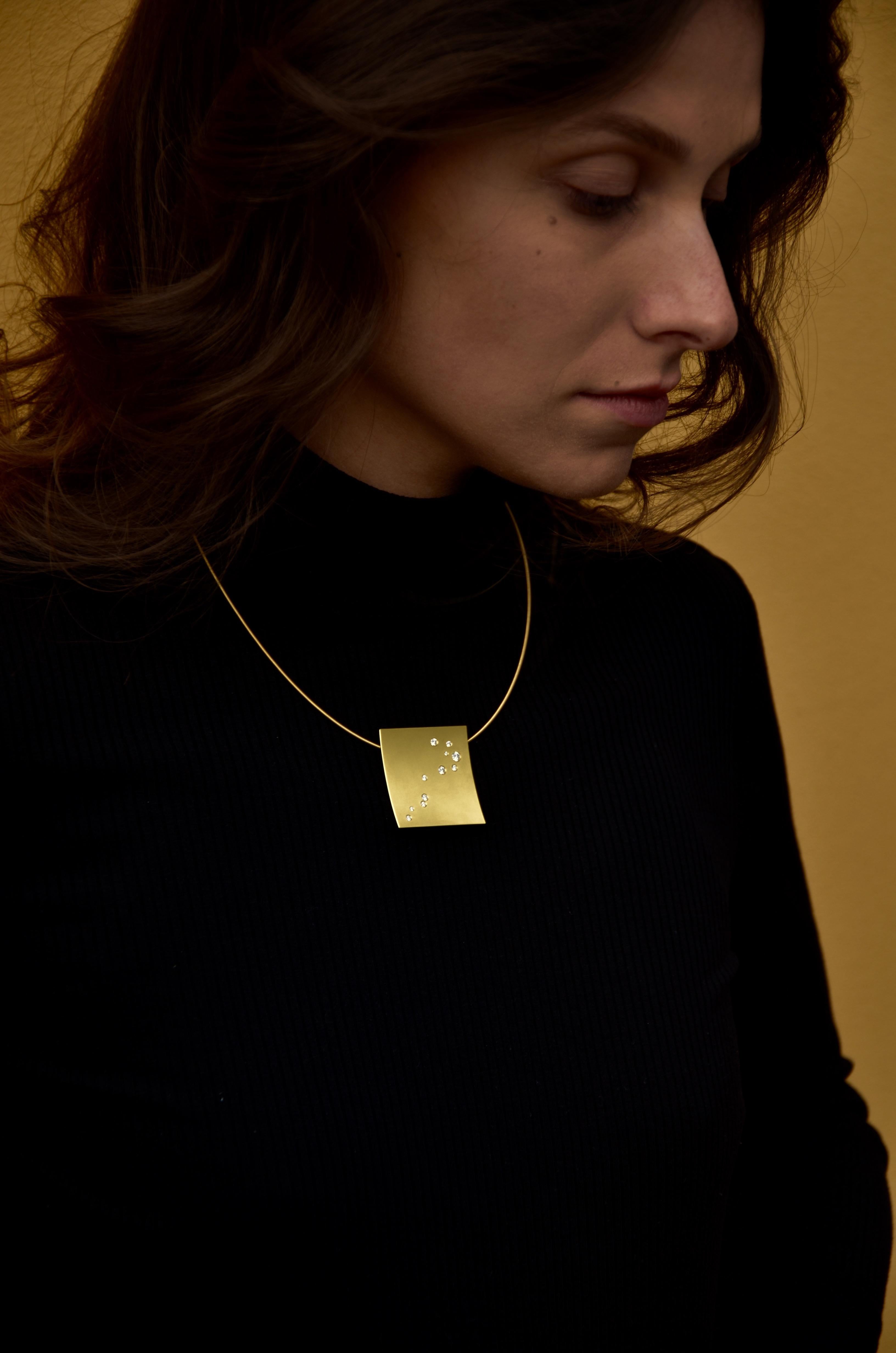 Women's or Men's Contemporary 18 karat Yellow Gold Diamond Pendant For Sale