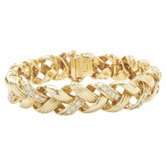 Armband aus 18 Karat Gelbgold mit Diamanten im Bandgeflecht