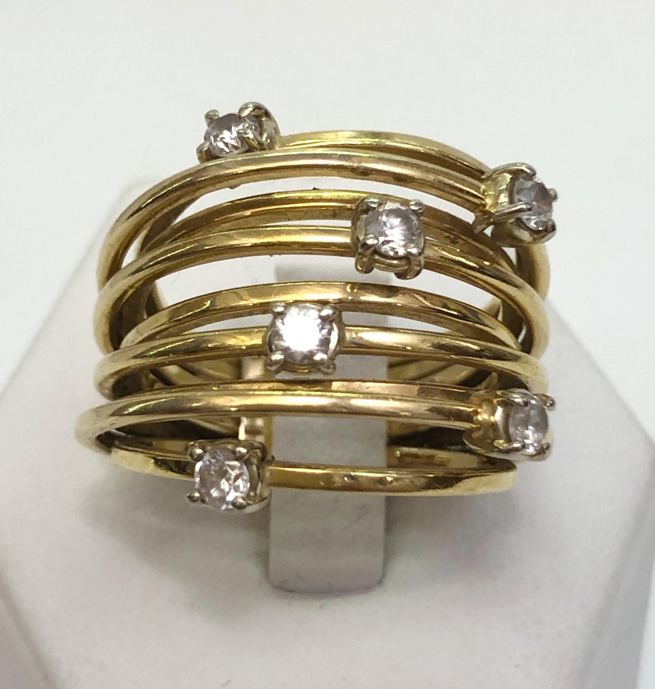 Mehrreihiger Ring aus 18 Karat Gelbgold mit Diamanten / Made in Italy 1980er Jahre
Ringgröße US 7