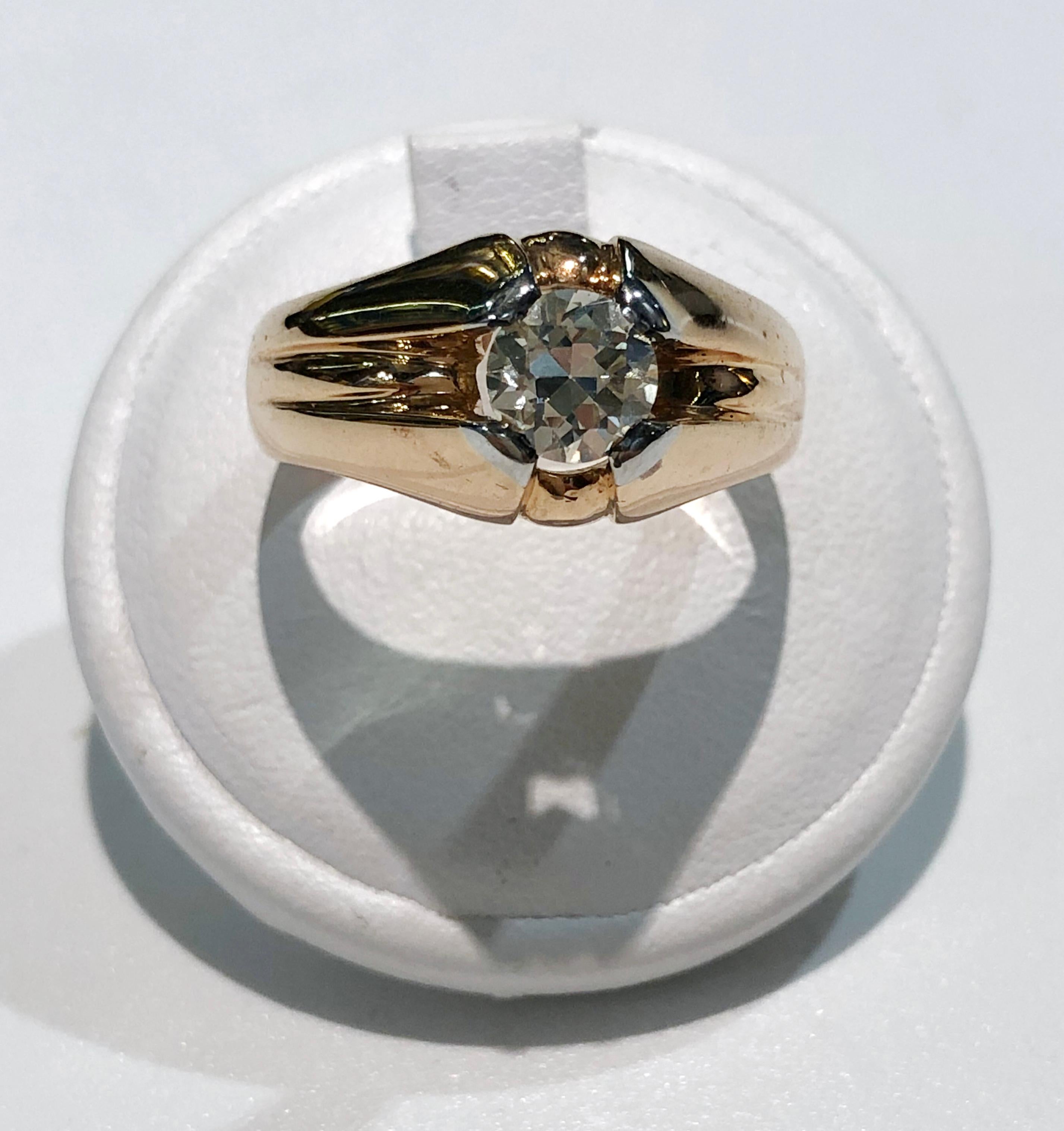 Vintage men's solitaire ring with 18 karat yellow gold band and a brilliant diamond of 0.7 karats, Italy 1950s
Ring size US 8