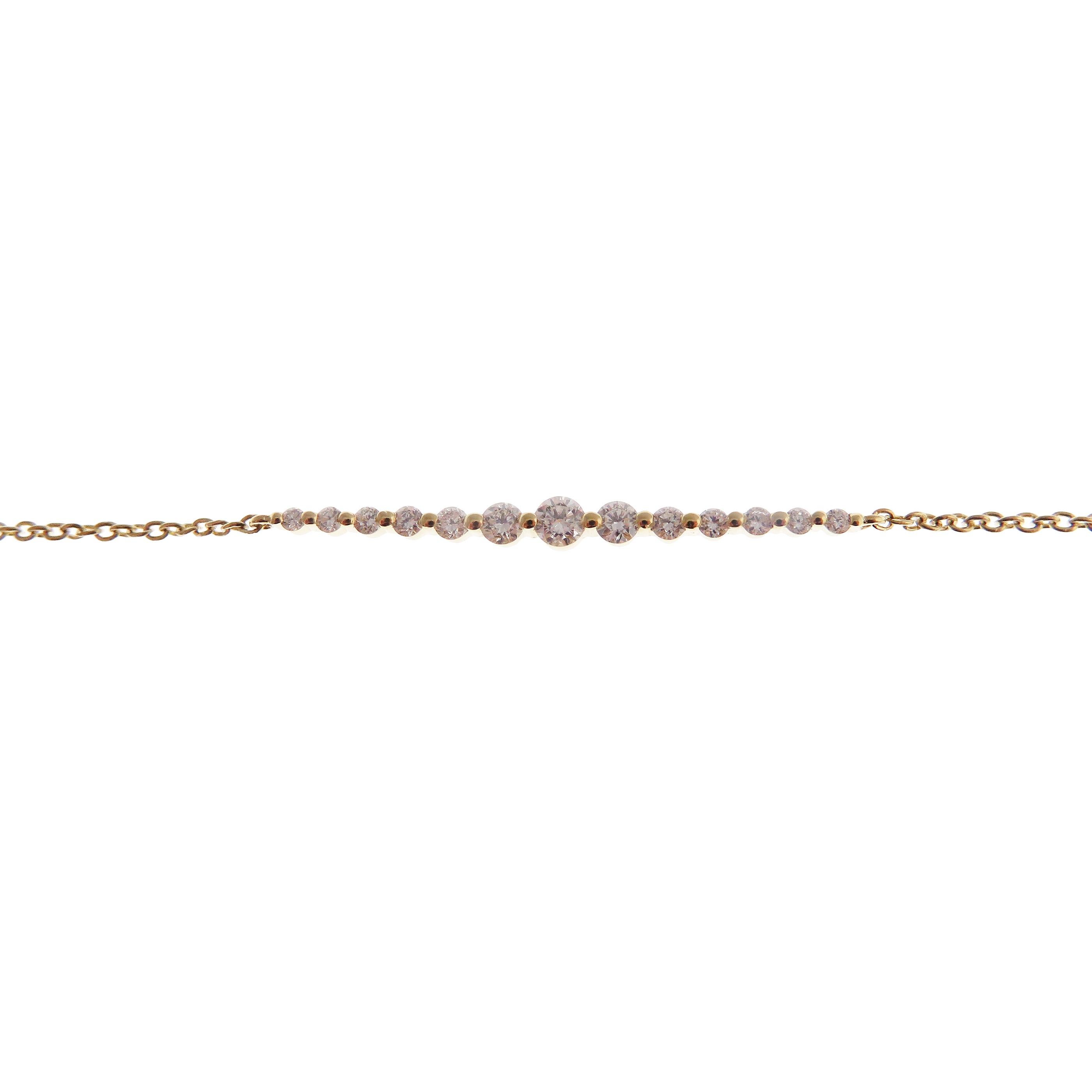This delicate, diamond bracelet is crafted in 18-karat yellow gold, weighing approximately 0.34 total carats of SI Quality white diamonds. 
Bracelet clasp is spring ring with adjustable size.

Bracelet is approximately 7