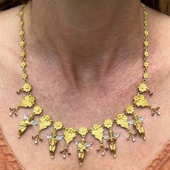 18 Karat Yellow Gold Diamond Ruby Cherub Drop Link Estate Vintage Necklace