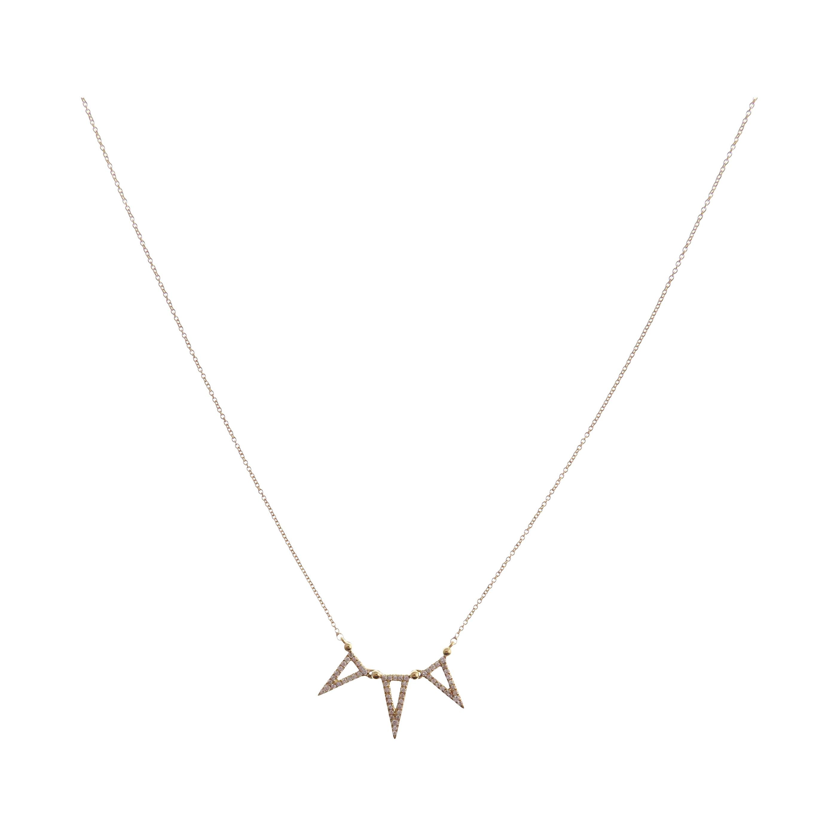 This spikey necklace is crafted in 18-karat yellow gold, weighing approximately 0.15 total carats of SI-H Quality white diamond. 

Necklace is 16