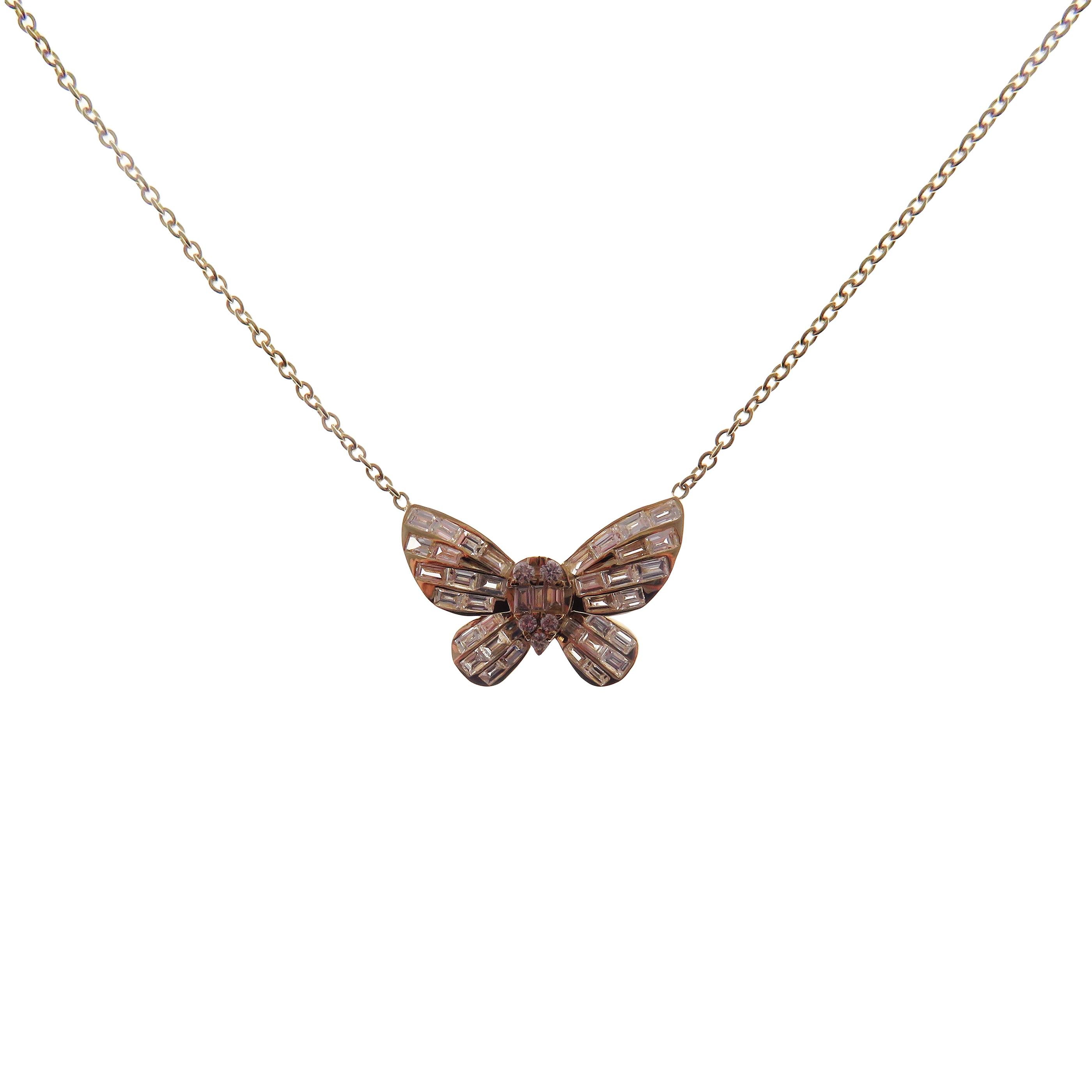 This small butterfly baguette diamond necklace is crafted in 18-karat yellow gold, weighing approximately 0.76 total carats of SI-V Quality white diamonds.

Necklace is 16