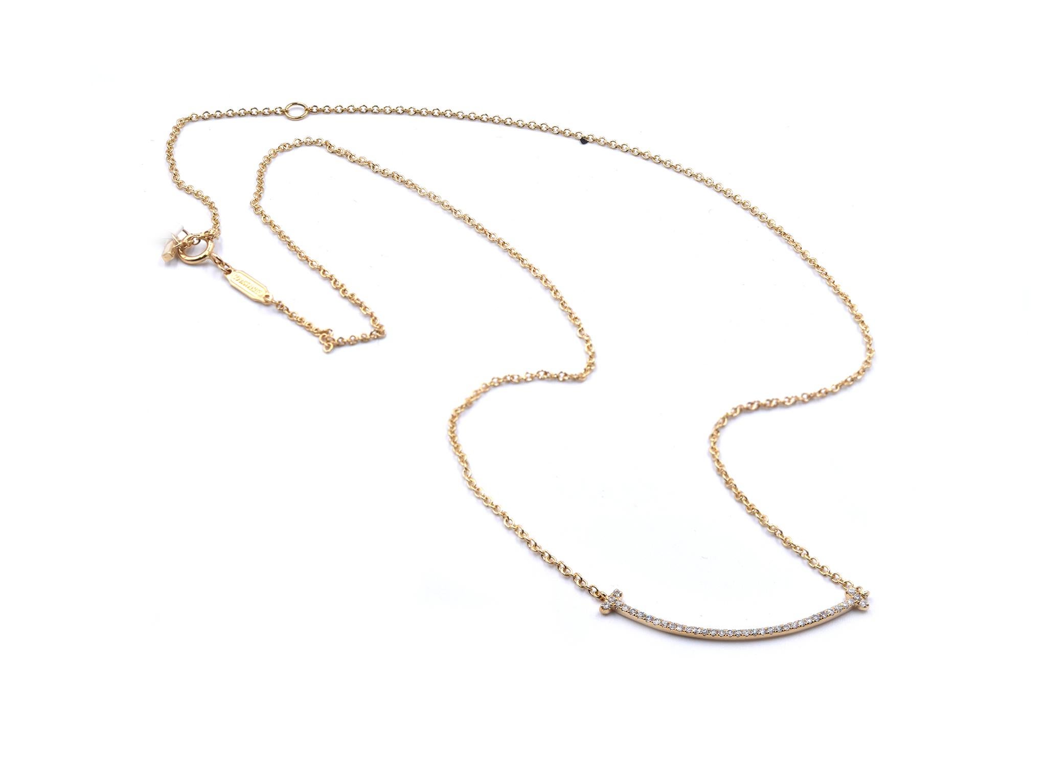 Designer: custom
Material: 18K yellow gold
Diamonds: 38 round brilliant cut = .12cttw
Color: G
Clarity: VS1
Dimensions: necklace measures 18-inches in length 
Weight: 2.62 grams
