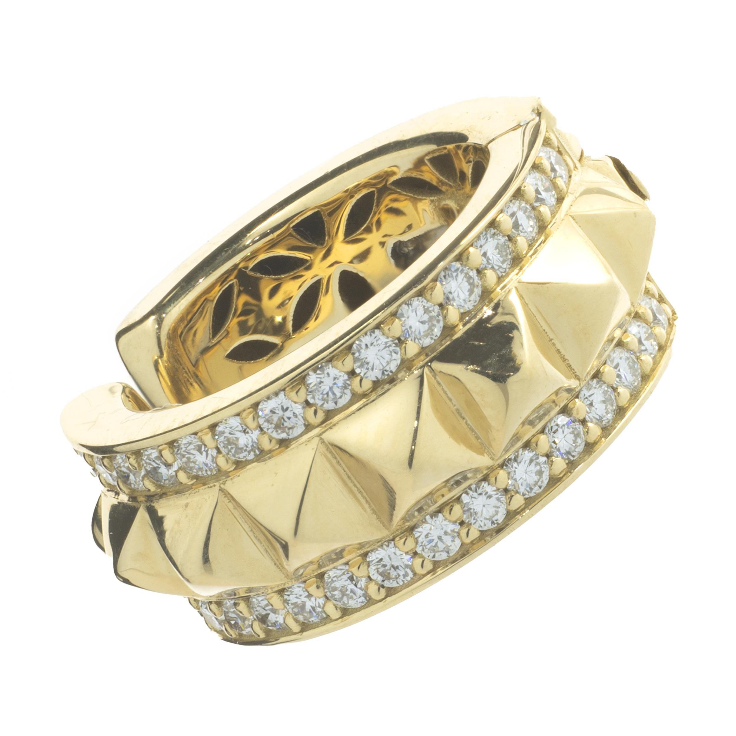Designer: custom designed 
Material: 18K yellow gold
Diamonds: 32 round brilliant cut = 0.23ttw
Color: G
Clarity: VS
Dimensions: cuff measures 14mm in length
Weight:  4.83 grams	
