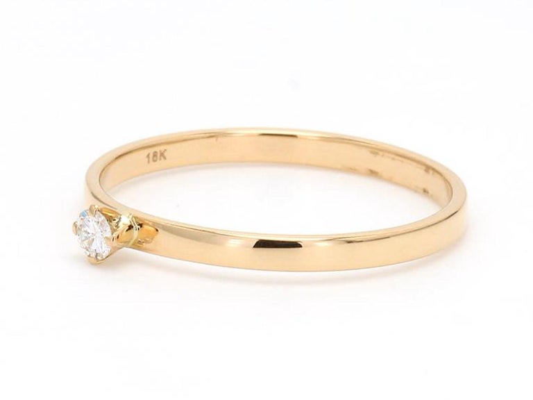 A Beautiful Handcrafted Ring in 18 Karat Yellow Gold with Natural Round Brilliant Cut Diamonds. A perfect Ring for the Special occasion

Natural Diamond Details
Pieces :  1 Pieces
Weight : 0.05 Carat 

Ring Details
Gold : 18 Karat Yellow Gold
Gold