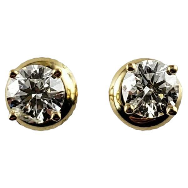 18 Karat Yellow Gold Diamond Stud Earrings For Sale