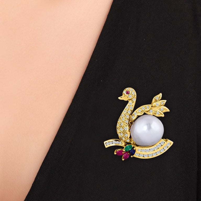 Modern 18 Karat Yellow Gold Diamond Swan Brooch with a South Sea Pearl Belly For Sale