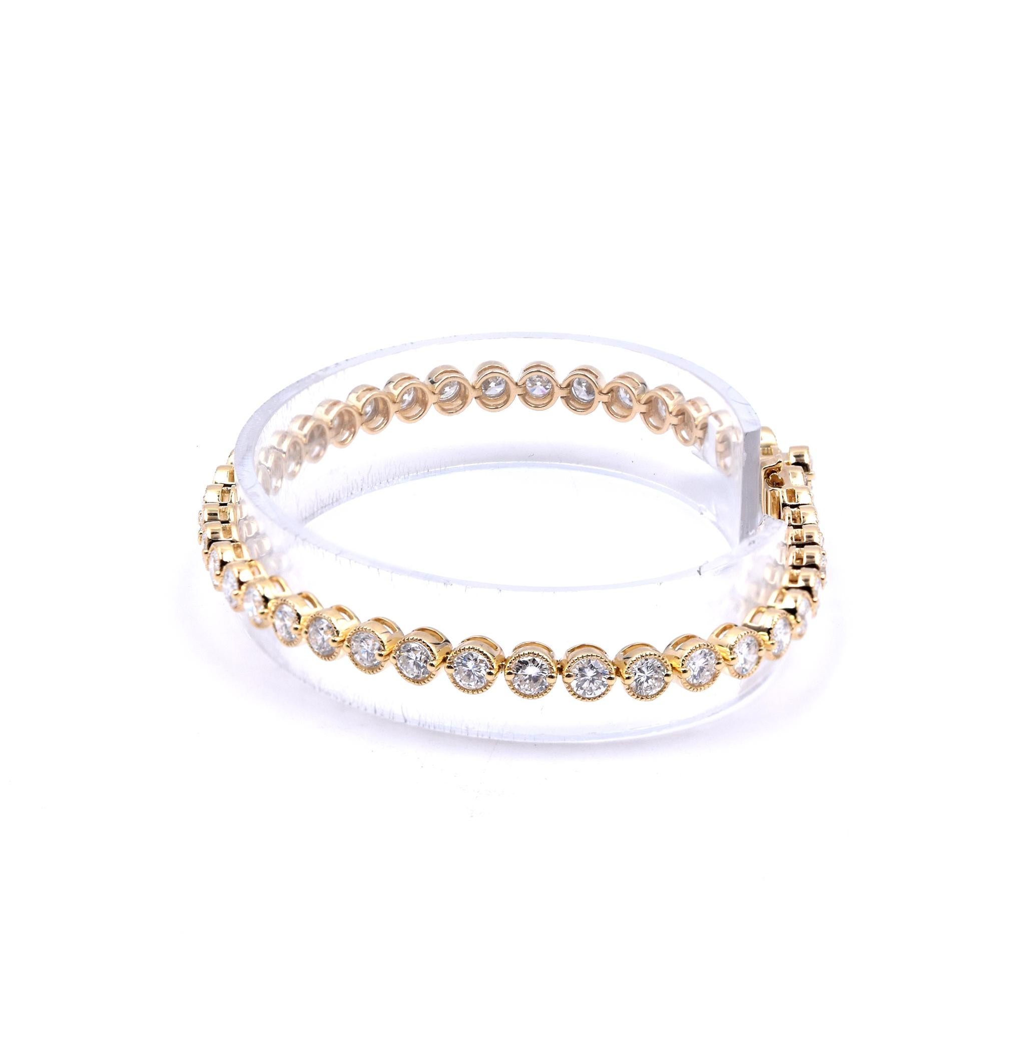 Designer: custom
Material: 18K yellow gold
Diamonds: 41 round brilliant cut = 5.00cttw
Color: H
Clarity: SI1
Dimensions: bracelet will fit up to a 7-inch wrist
Weight: 12.96 grams
