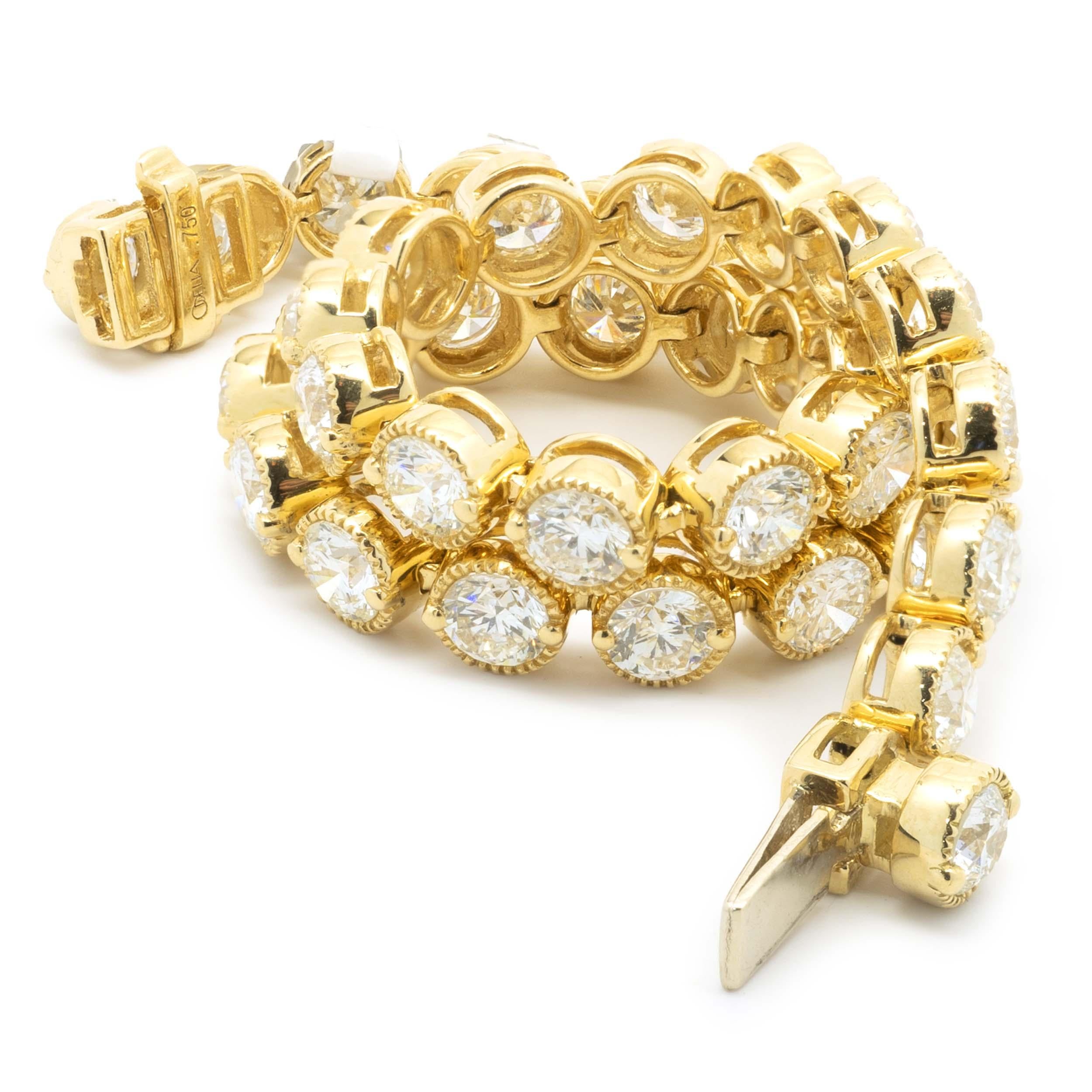 Designer : custom
Matériau : or jaune 18K
Diamants : 38 diamants ronds de taille brillant = 7,00cttw
Couleur : H
Clarté : SI1
Dimensions : le bracelet convient à un poignet de 7 pouces maximum
Poids : 14,15 grammes
