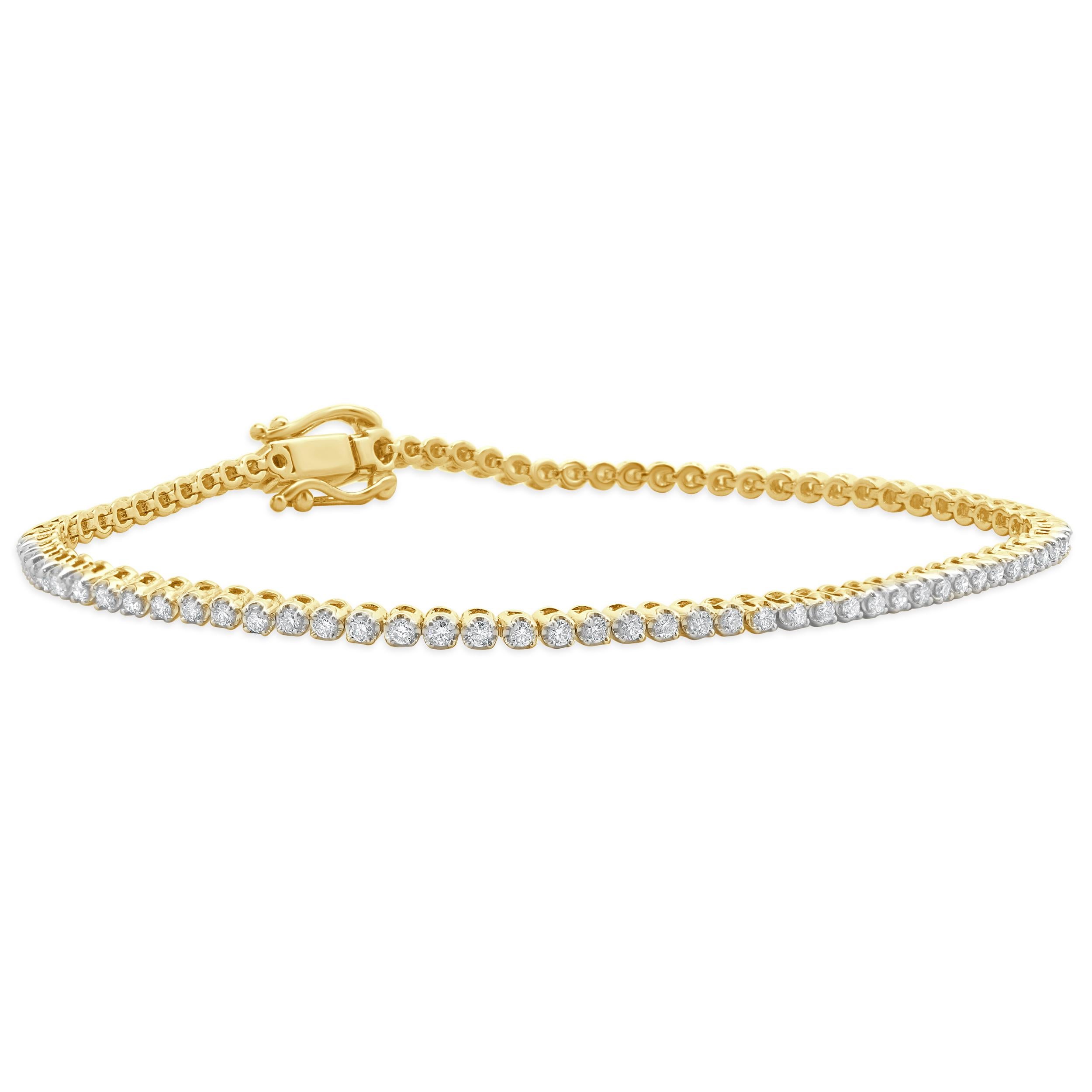 Material: 18K yellow gold
Diamonds: 82 round brilliant cut = 1.07cttw
Color: I
Clarity: VS2
Dimensions: bracelet will fit up to a 7-inch wrist
Weight: 8.20 grams

