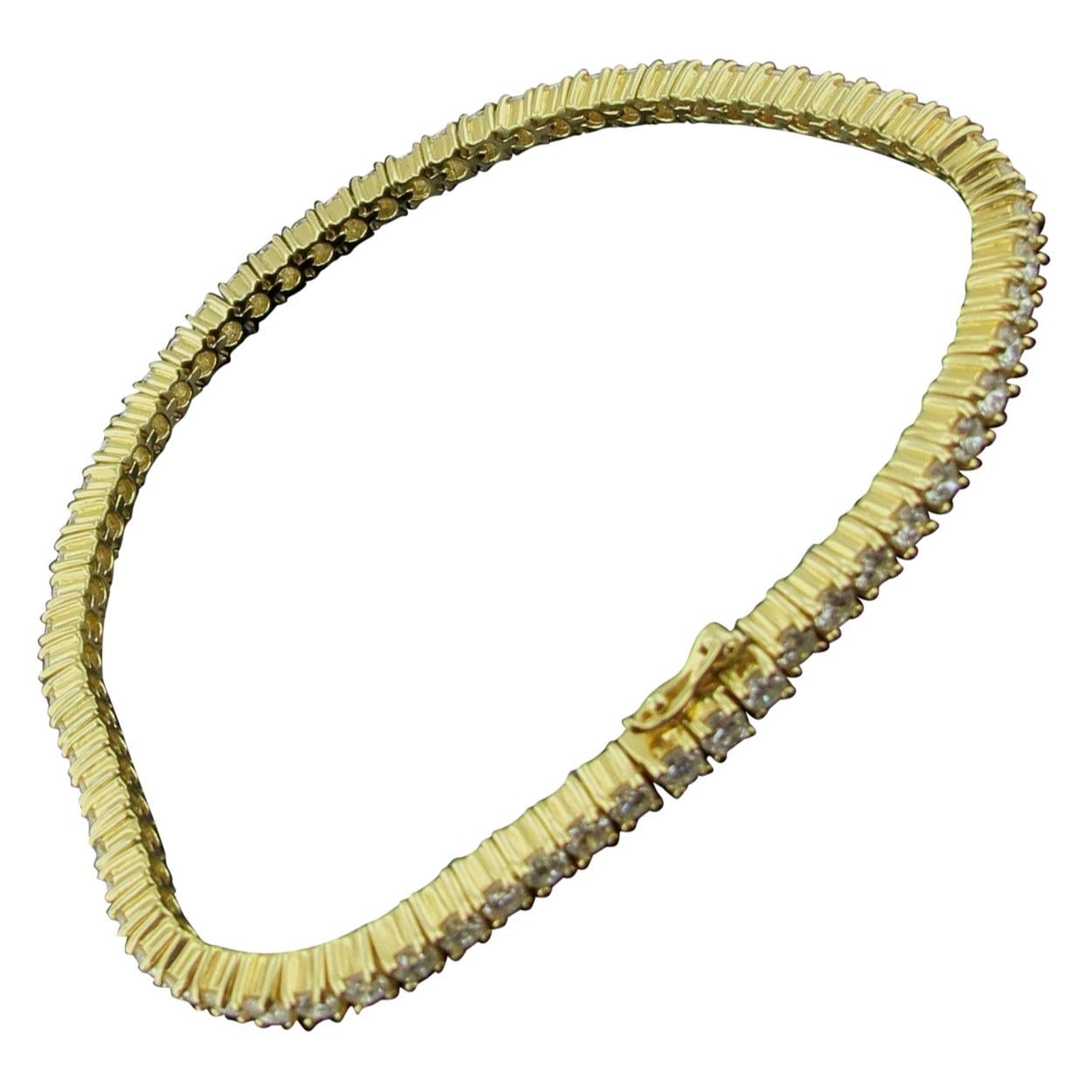 18 Karat Yellow Gold and Diamond Tennis Bracelet For Sale
