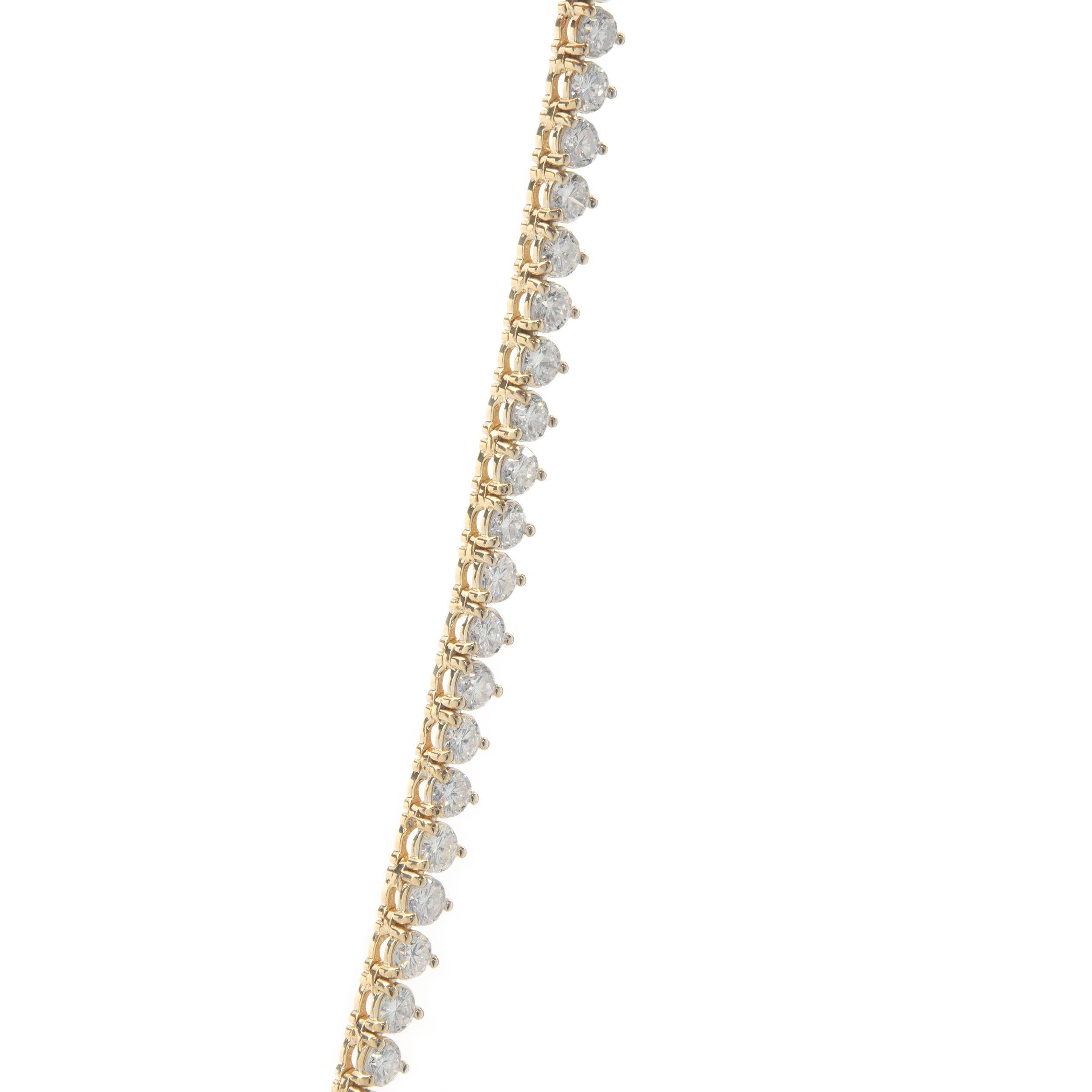 Designer: custom design
Material: 18K yellow gold
Diamond: 142 round brilliant cut = 10.01cttw
Color: G
Clarity: VS2
Dimensions: necklace measures 17-inches in length 
Weight: 21.77 grams