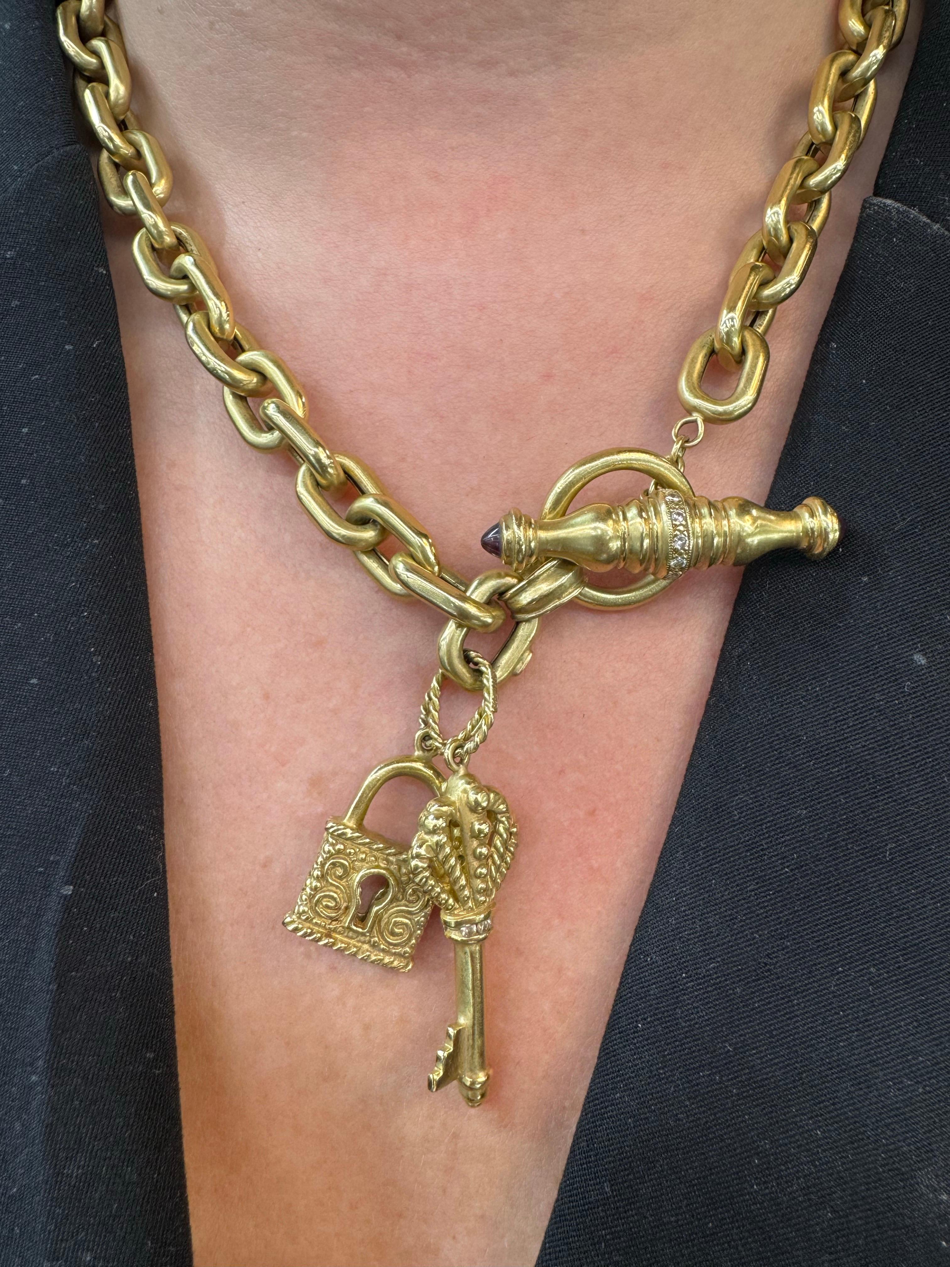 Women's 18 Karat Yellow Gold Diamond Toggle Necklace with Key and Lock Charms 79.4 Grams For Sale