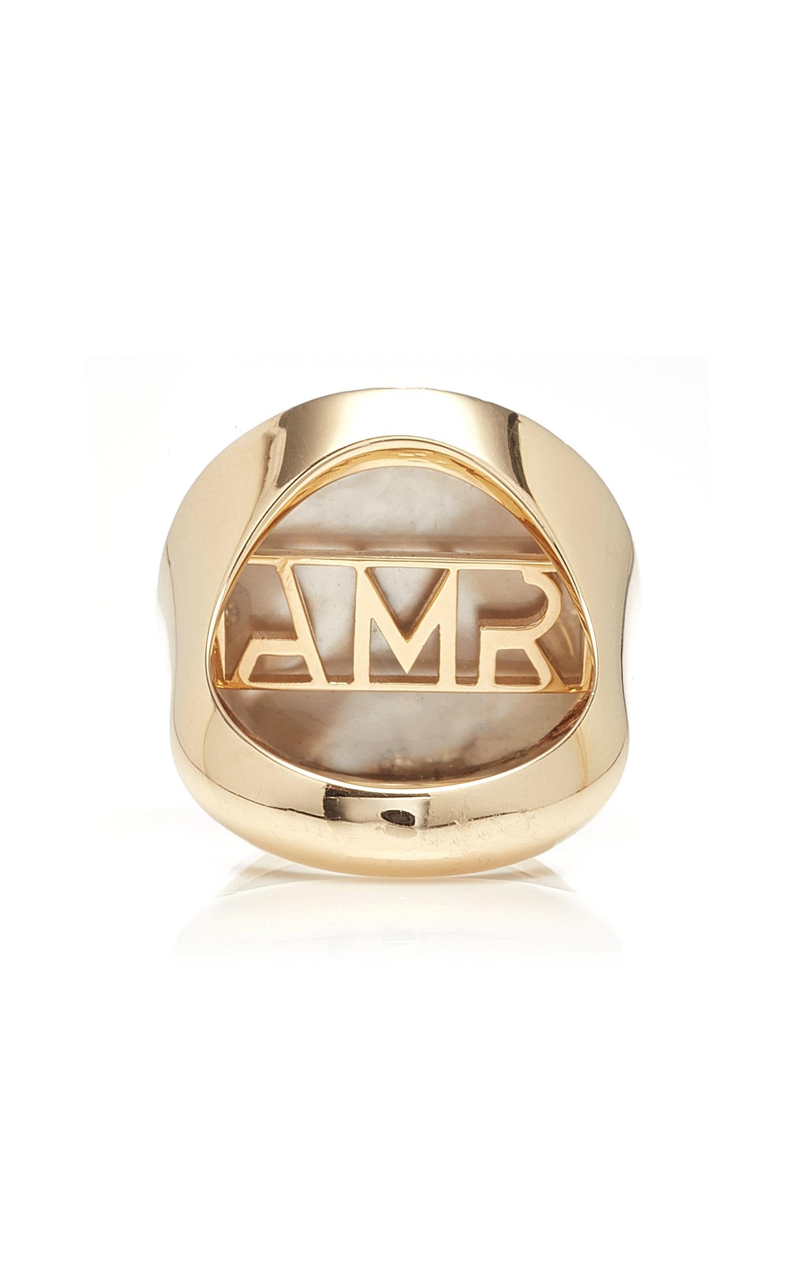 Inspired by the concept of time, Anna Maccieri Rossi's 'ORA Chevalier Ring' features a pink mother of pearl dial with the hours of the day marked by 4 diamonds indexes with diamond star at center. 
PRODUCT DETAIL:
Composition-> 18K yellow gold 9g,