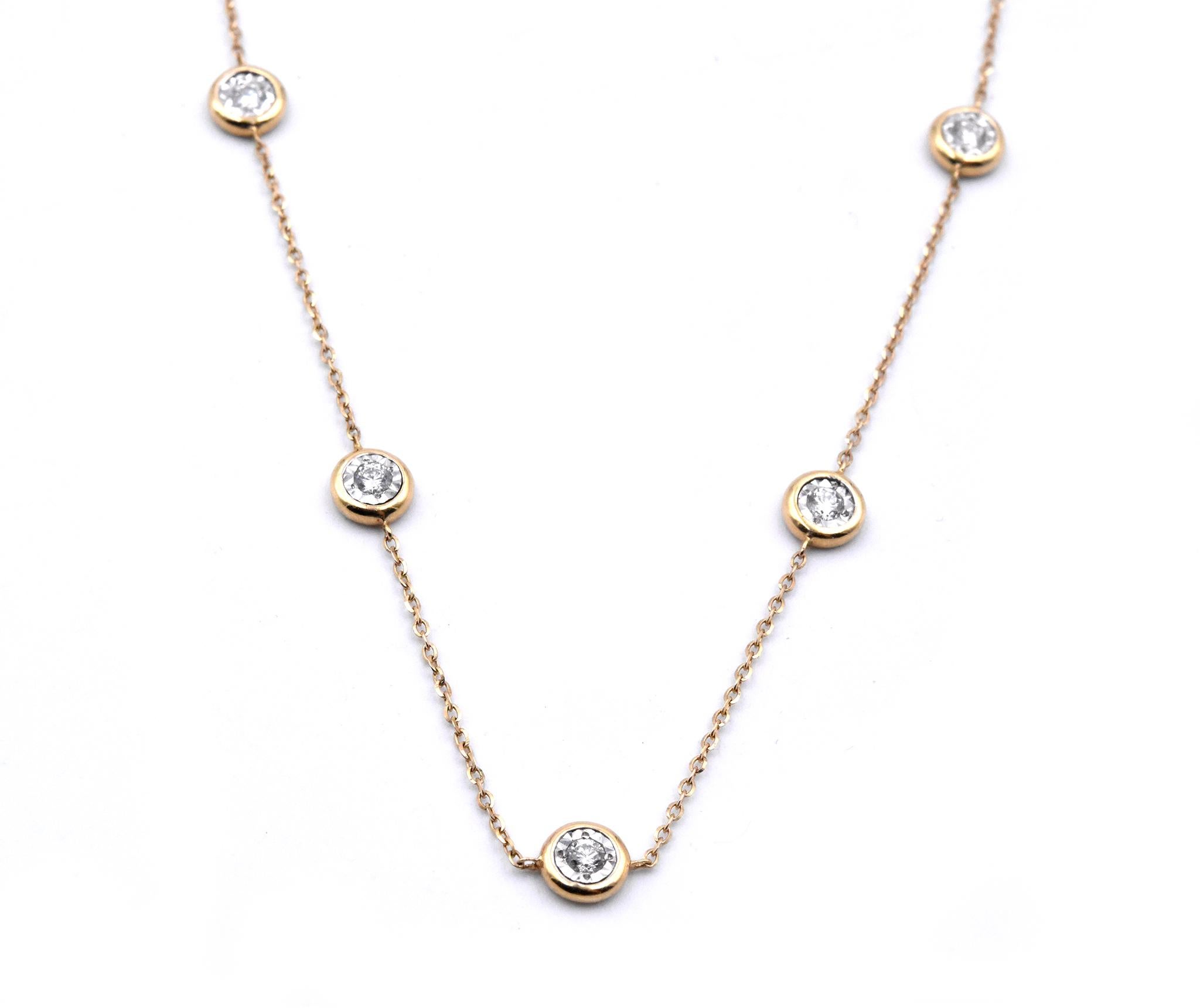 Material: 18k yellow gold
Diamonds: 13 round brilliant cuts = .84cttw
Color: G
Clarity: VS
Dimensions: necklace is 18-inches in length
Weight: 4.76 grams