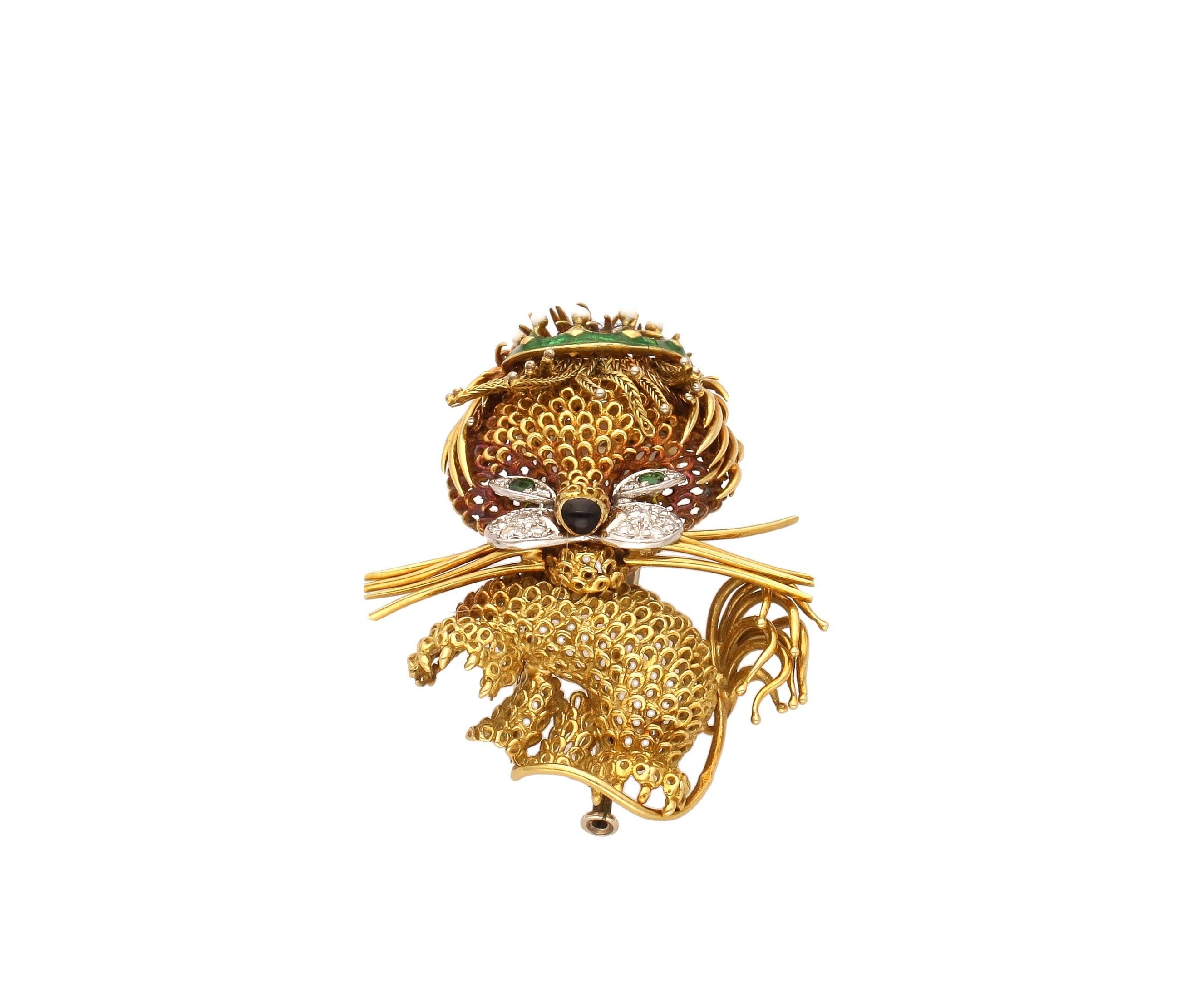 18 kt. yellow gold brooch with 0.40 carat of round-cut diamonds, enamel and 0.08 carat of emeralds round-cut.
This funny brooch is from 1950 circa, hand-made in Italy.