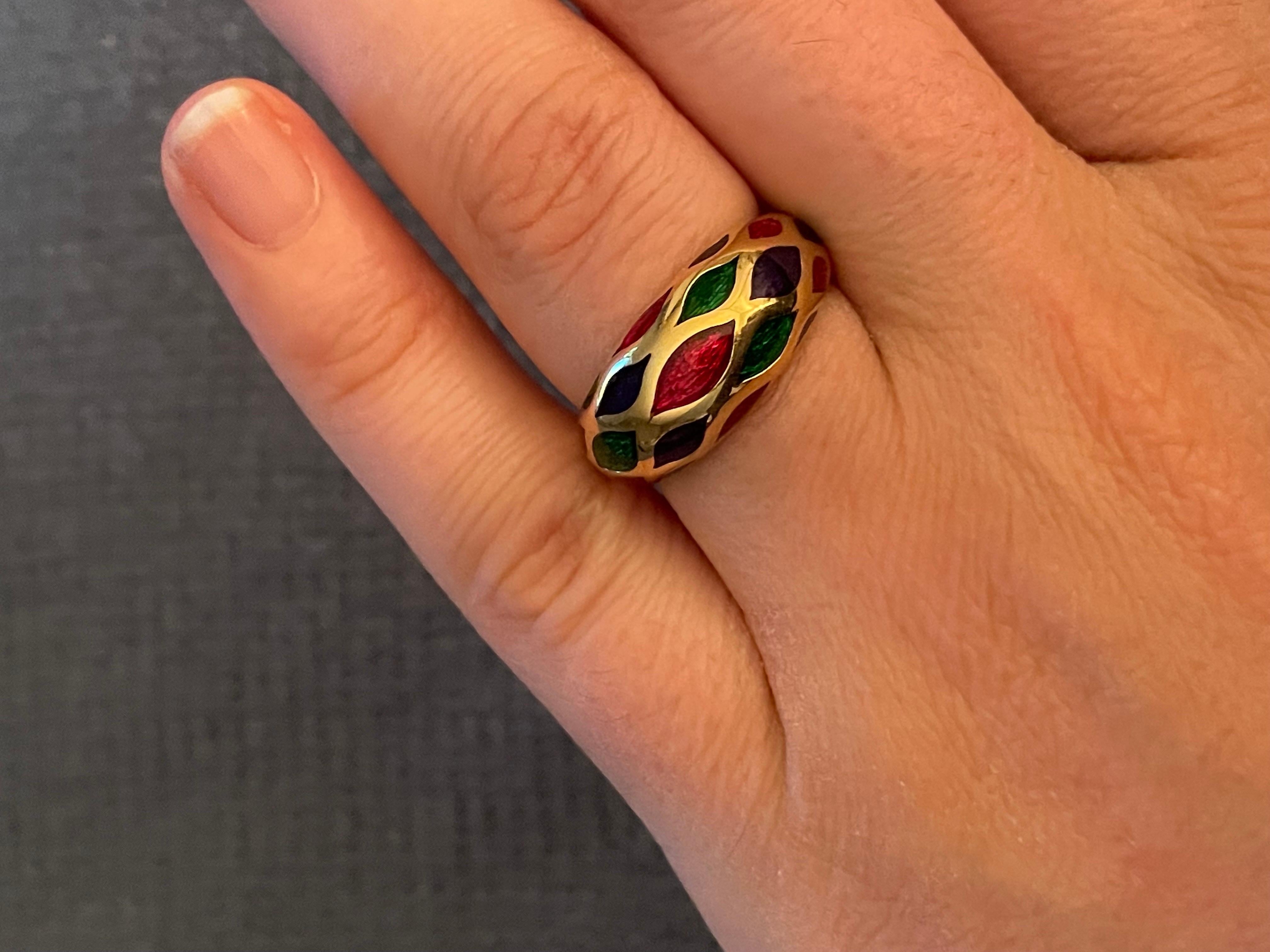 18 Karat yellow gold dome ring featuring three different enamel colors: Red, Green, Blue weighing 6.4 grams.
Great for staking!  
