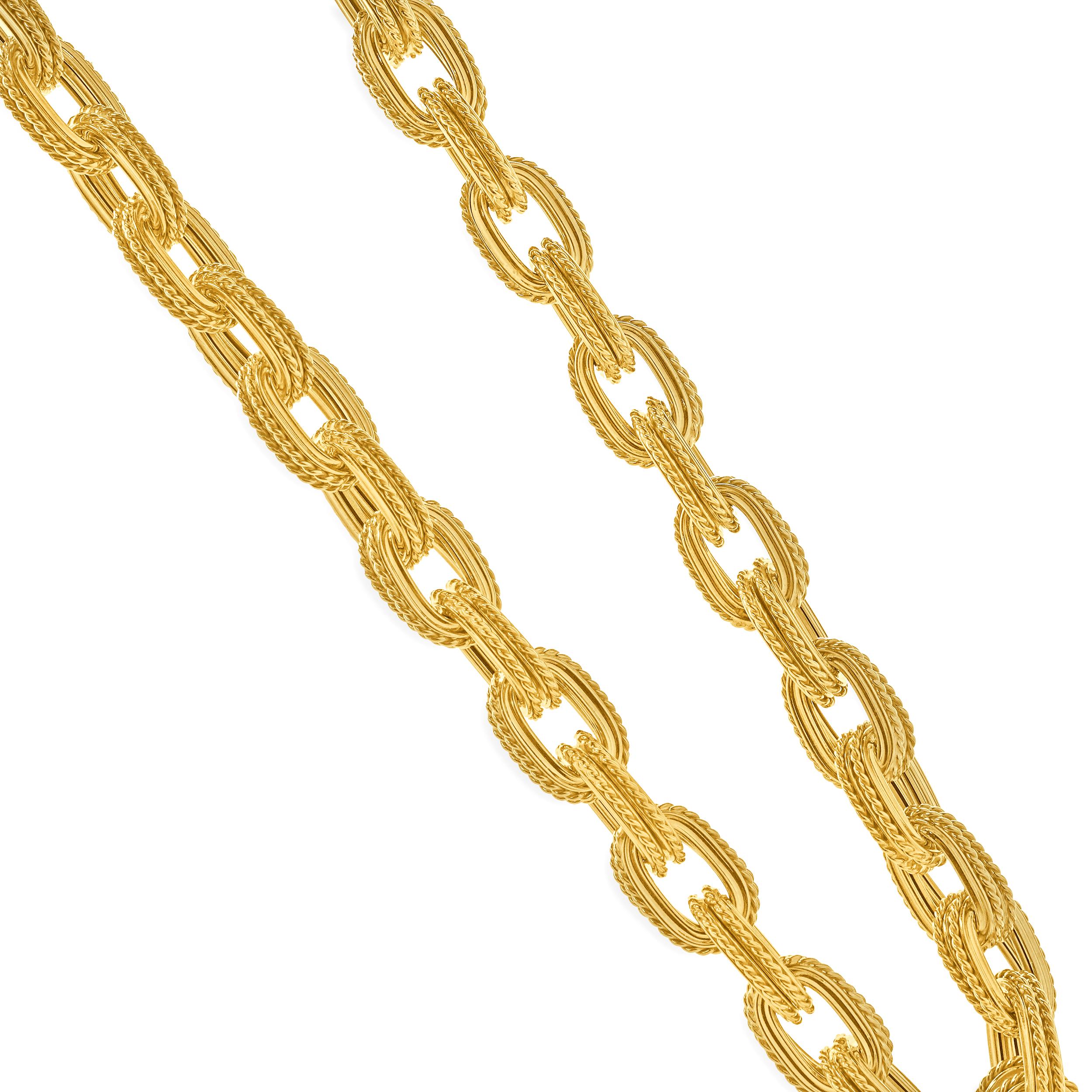 Concepteur : personnalisé
Matériau : Or jaune 18K
Dimensions : le collier mesure 18.25 pouces de long.
Poids : 65,67 grammes