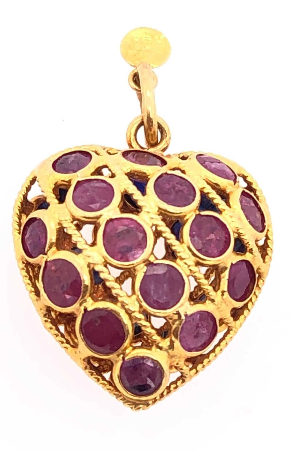 18 Karat Yellow Gold Double Sided Heart Charm / Pendant Ruby and Sapphire
2.03 grams total weight.