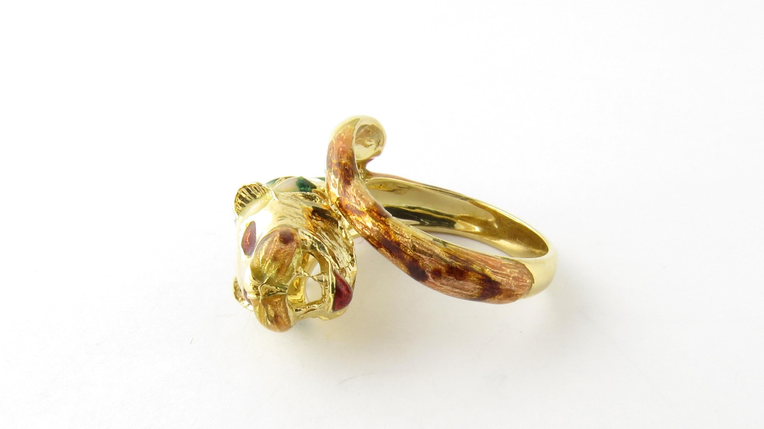 Vintage 18 Karat Yellow Gold Lion Head Ring Size 7

This elegant ring features a stunning lion accented with green, red and white enamel and crafted in classic 18K yellow gold. Width: 18 mm. Height: 9 mm. Shank: 3 mm.

Ring Size: 7

Weight: 6.2 dwt.
