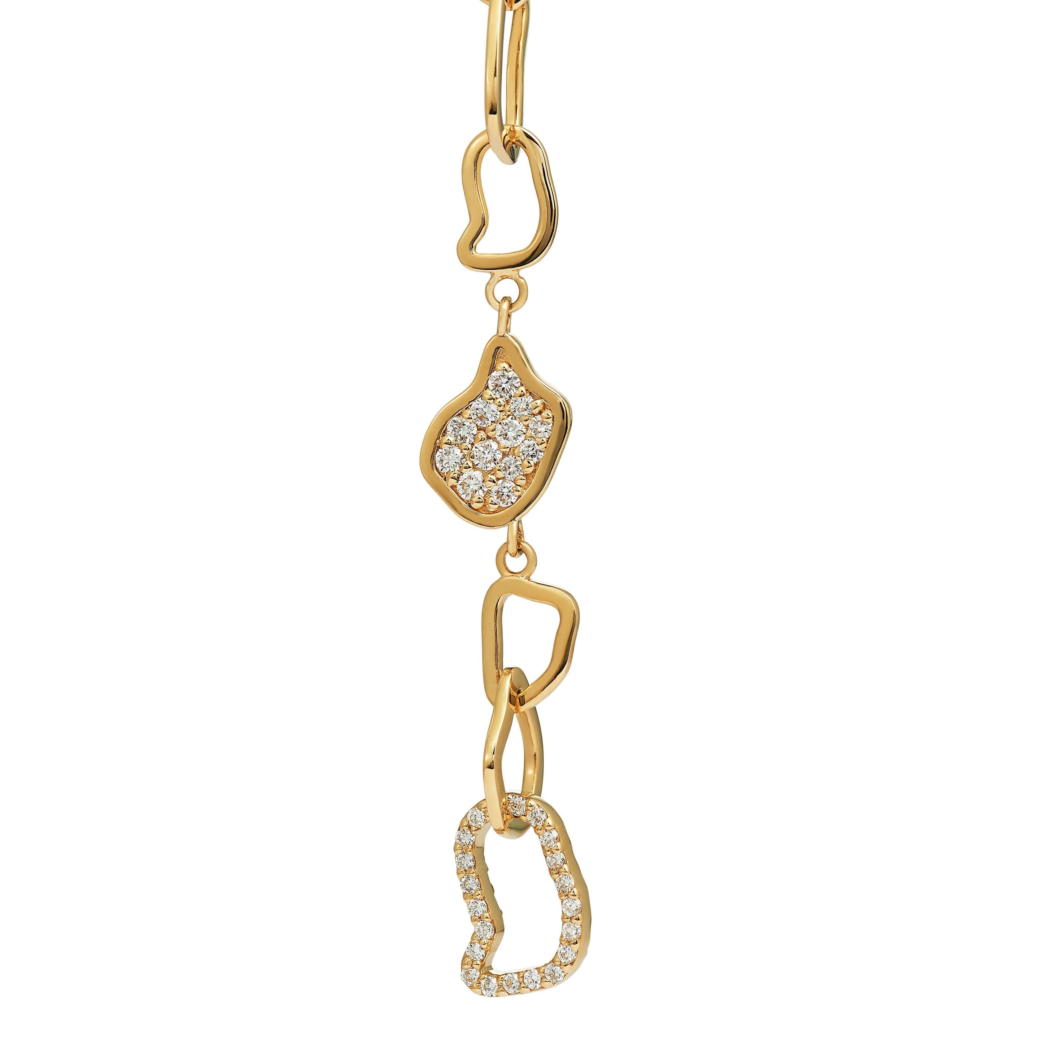 18 Karat Yellow Gold Drop Earrings Set With Diamonds

This pair of yellow gold diamond earrings will make any look a head-turner. Part of the Twiga collection, they feature intricate detail resembling the giraffe's spots and have an average gold
