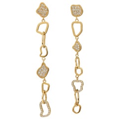 Boucles d'oreilles pendantes en or jaune 18 carats avec diamants