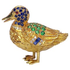 18 Karat Yellow Gold Duck Brooch with Diamonds, Sapphires and Tsavorites